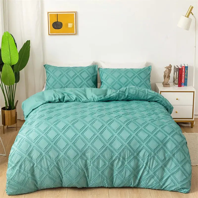 Teal quilted bedding set with diamond pattern complementing decorbites geometric cut flowers duvet cover design