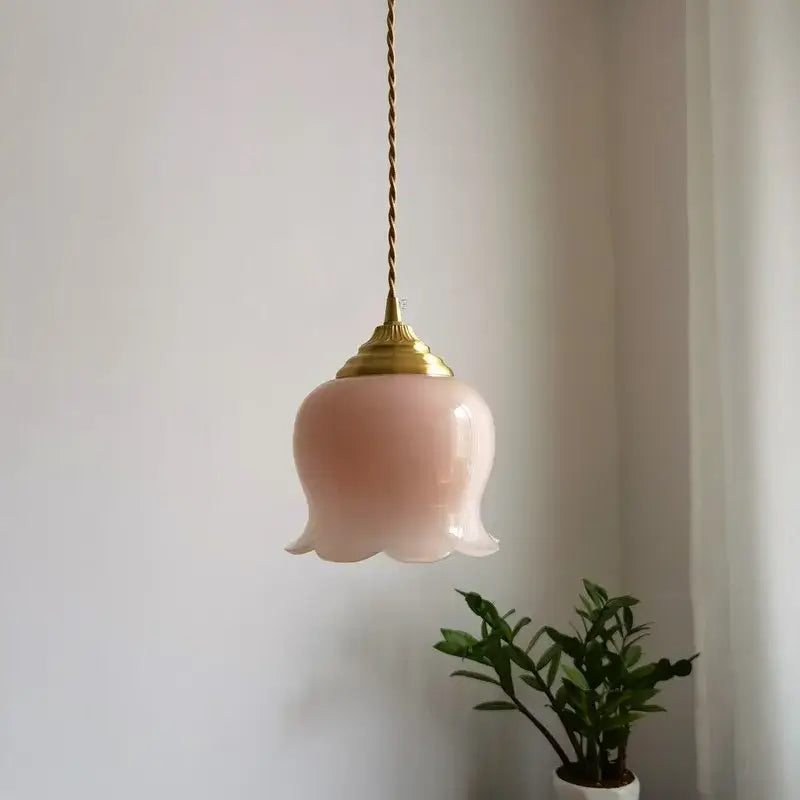 Delicate pink glass copper led pendant light with gold fixture and twisted cord for kitchen decor and lighting