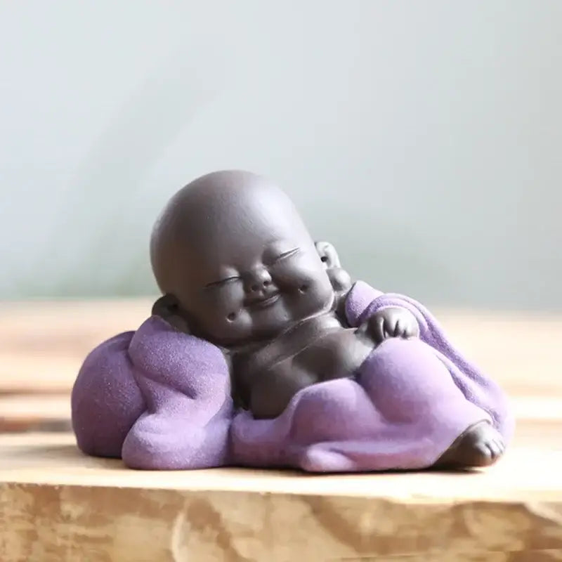 Purple ceramic maitreya buddha statue tea sculpture of smiling sleeping baby buddha for living room decor