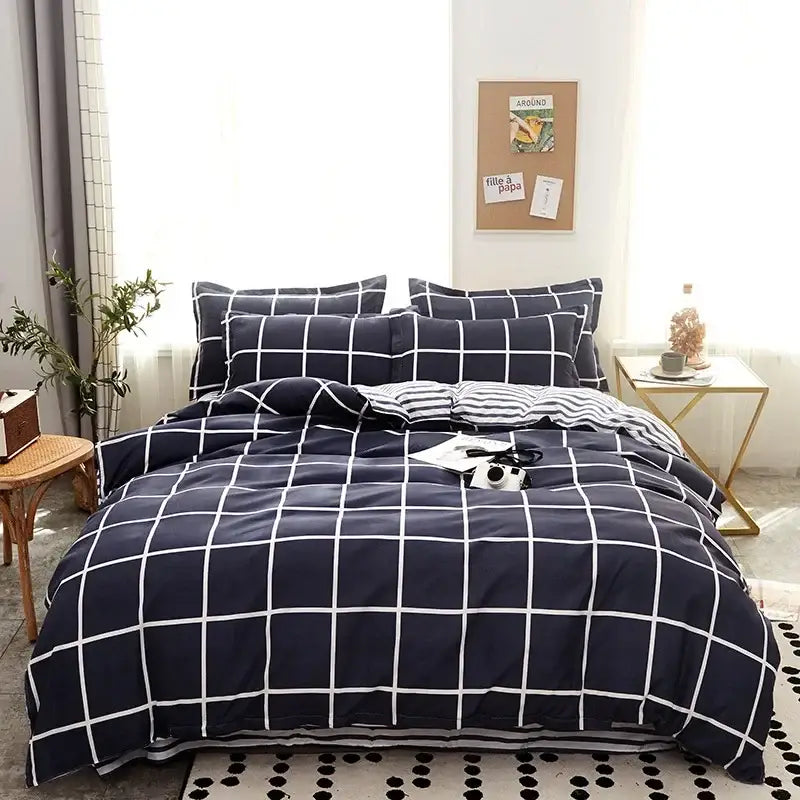 Navy blue and white grid-patterned satin finish bedding set with matching pillows from decorbites cartoon print collection
