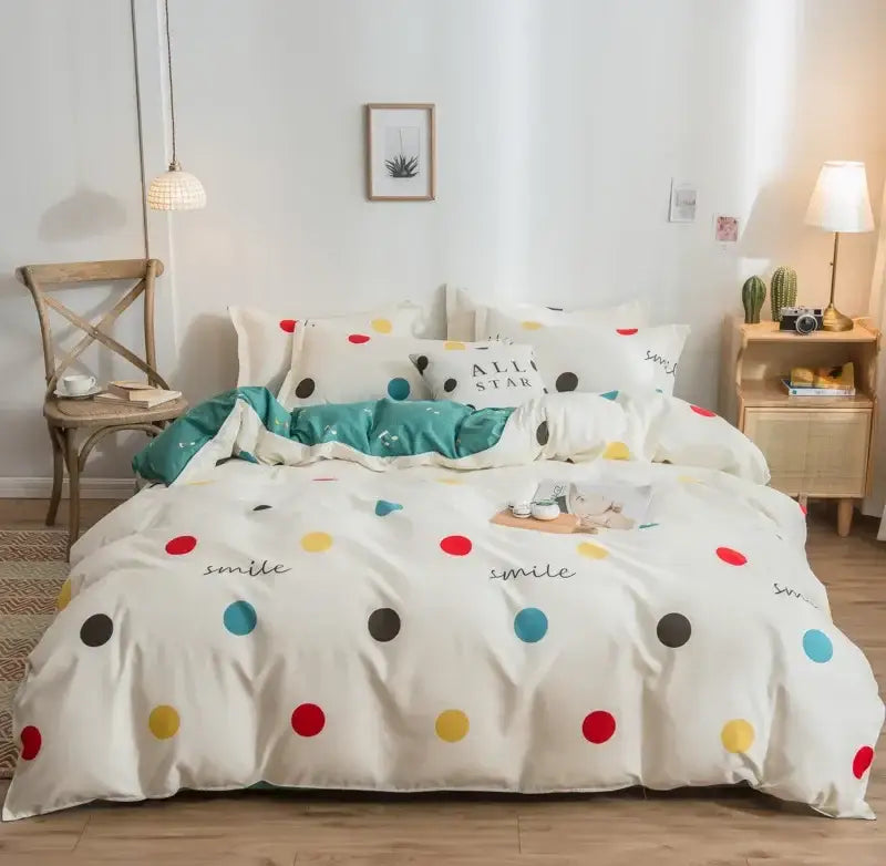 White satin finish duvet cover with colorful polka dots and smile print in decorbites cartoon print bedding set