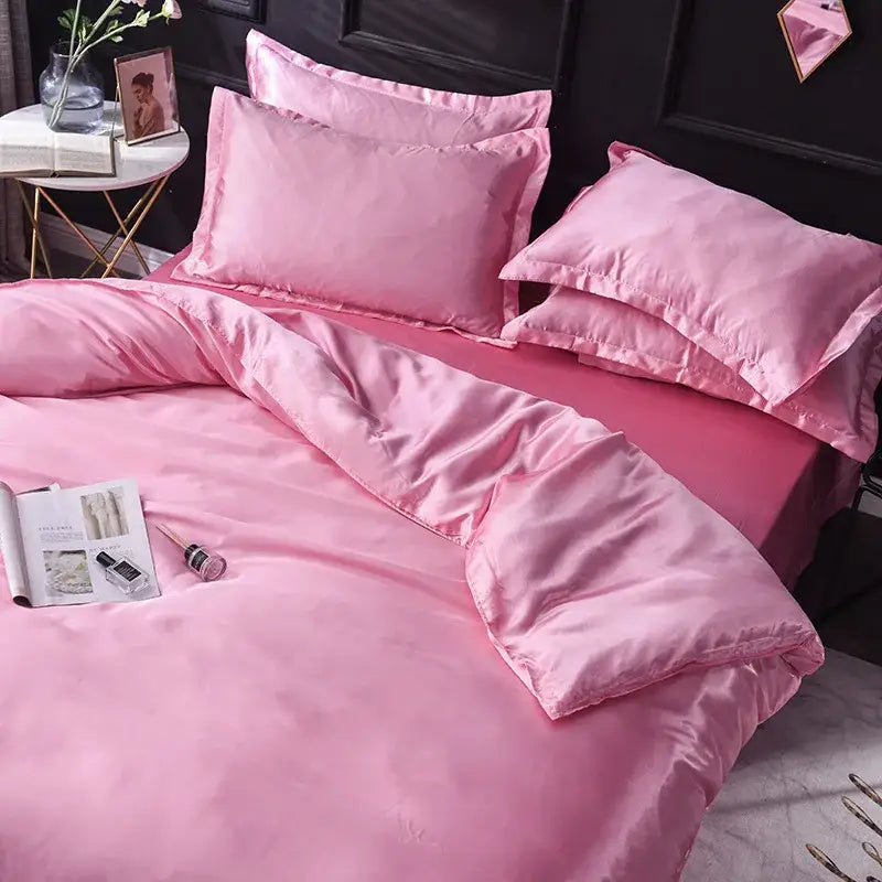 Pink ice rayon satin bedding set with glossy finish and matching pillows for cooling comfort by decorbites ice rayon