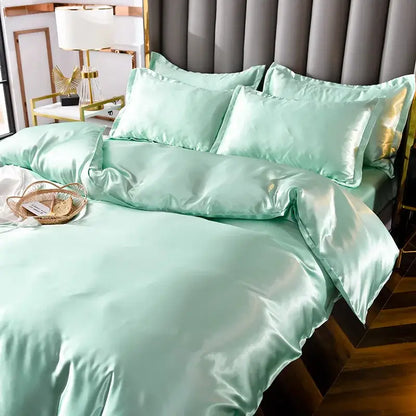 Luxe mint green satin bedding set with glossy finish and matching pillowcases from decorbites ice rayon satin collection