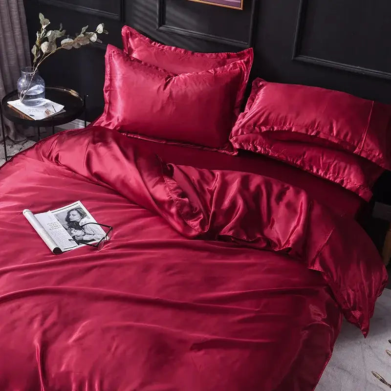 Rich crimson satin bedding set with glossy smooth texture and elegant ruffled edges made from decorbites ice rayon satin
