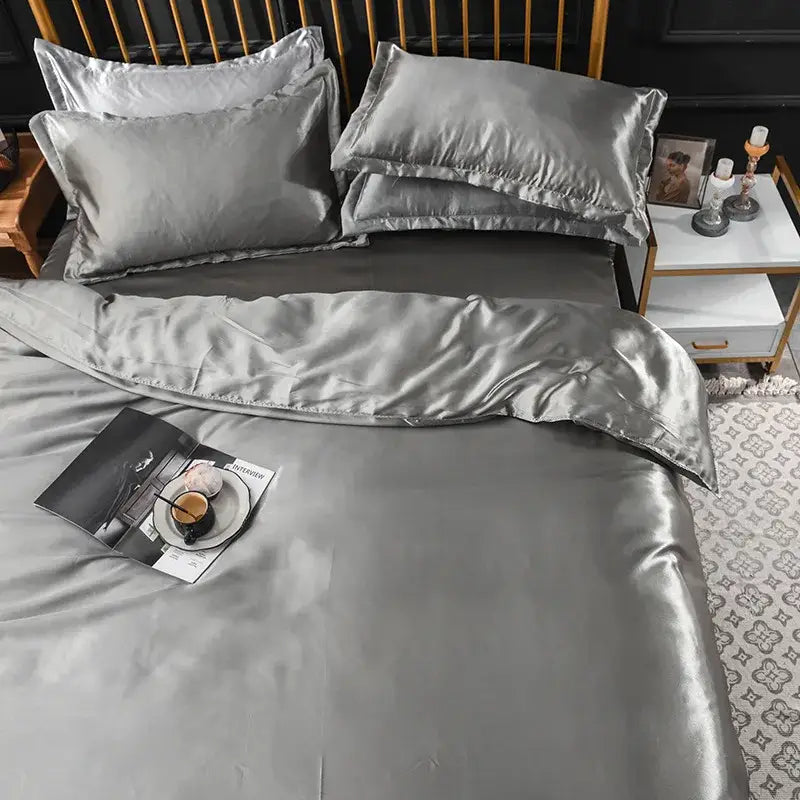 Silver satin bedding set with smooth glossy finish and elegant drape made of decorbites ice rayon satin for cooling comfort
