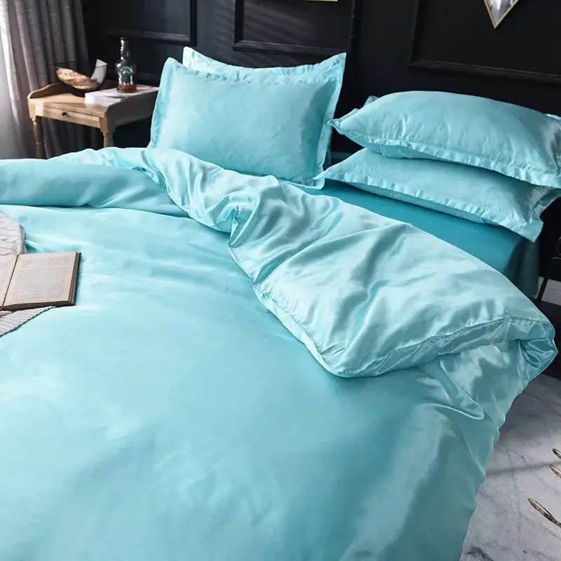 Turquoise ice rayon satin bedding set with glossy finish and stitched edges from decorbites pink ice rayon collection