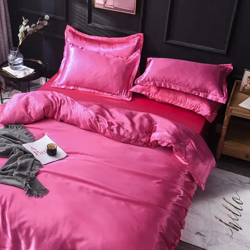 Vibrant fuchsia ice rayon satin bedding set with matching pillows and duvet cover for cooling bedroom comfort