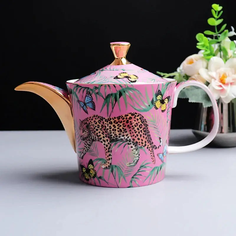 Pink jungle animals bone china ceramic teapot with gold trim featuring detailed leopard and butterflies decorbites jungle animals