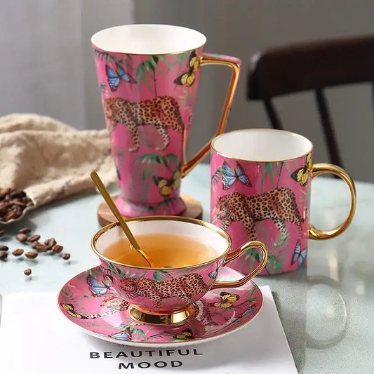Pink jungle animals bone china teacup and saucer set with gold trim featuring leopards and butterflies for dining room decorbites jungle animals
