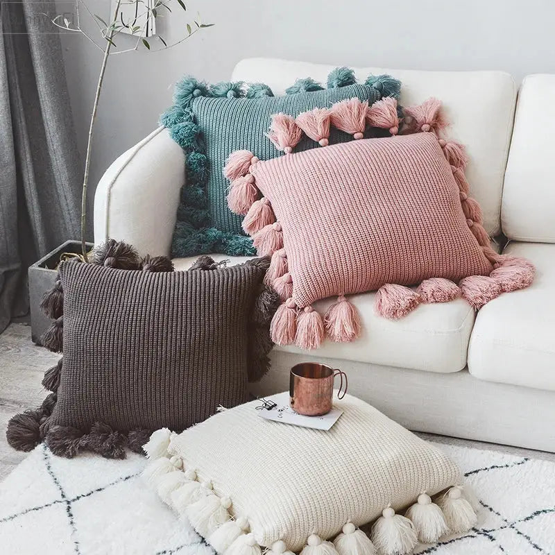 Pink knit cushion cover with fluffy tassels along edges perfect for living room decorbites knit cushion decor