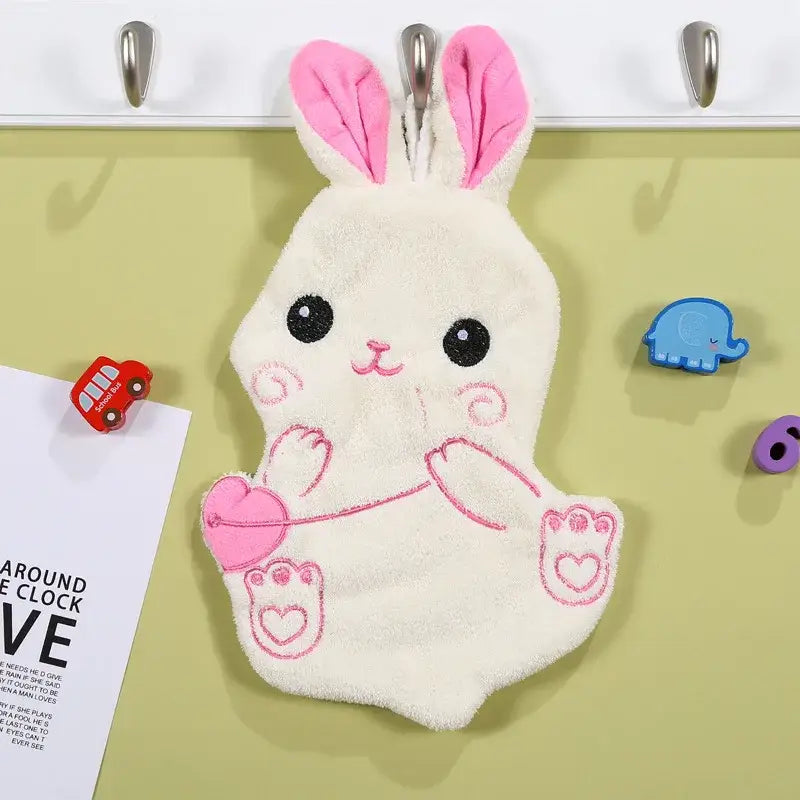 A soft white plush cartoon animal shape hand towel with pink embroidered details for bathroom decorbites cartoon animal decor