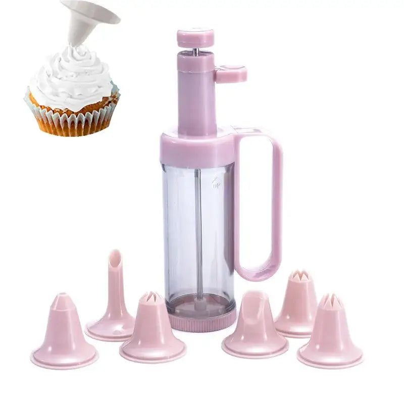Pink plastic cream decorating gun with clear cylindrical body and matching pink nozzle attachments for baking use