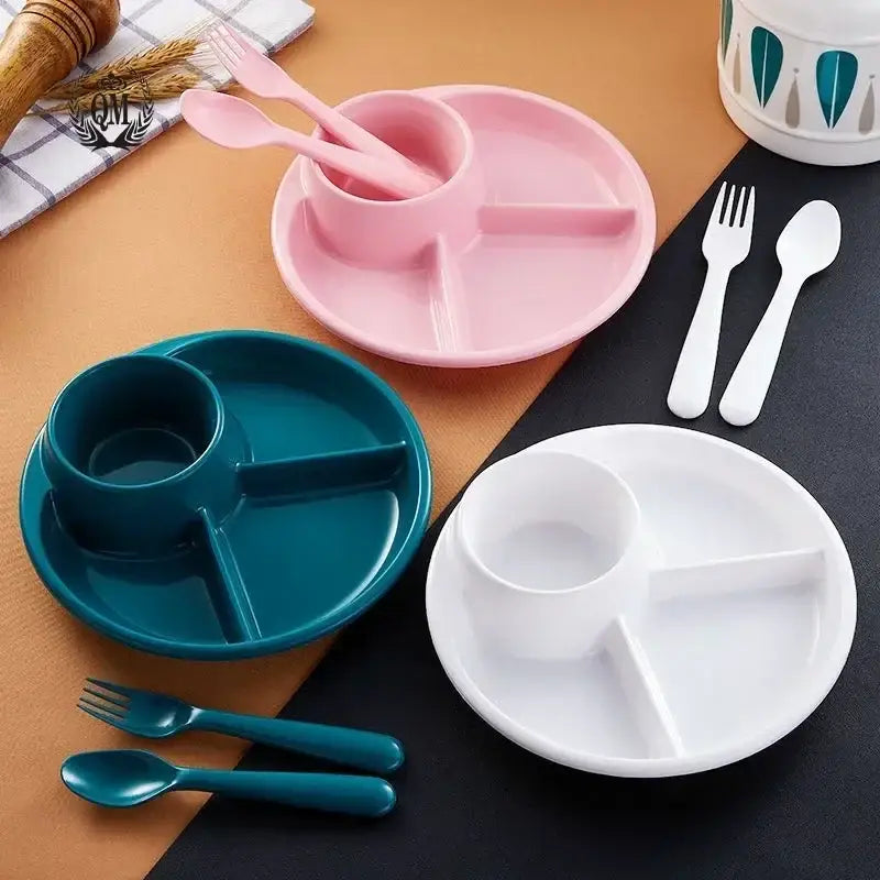 Pink plastic portion control plate with three compartments and integrated cup for kids meal dining room use