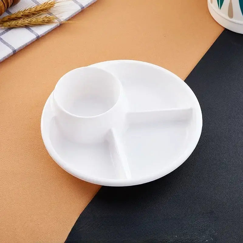 White ceramic portion control plate with central cup and two rectangular compartments for kids meal tray use