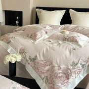 Delicate blush pink and cream floral embroidered bedding set with pink purple flowers on satin egyptian cotton fabric
