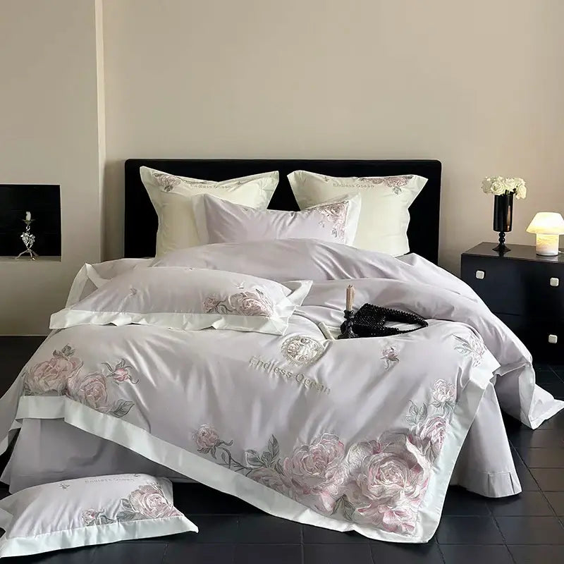 White satin bedding set with pink purple flowers embroidery in egyptian cotton for elegant bedroom decor