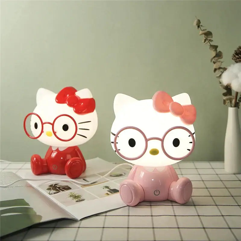 Two hello kitty night lights in red and pink with bows and glasses for decorbites cartoon animal night light bedroom use