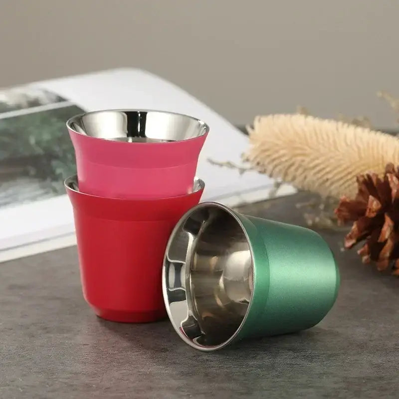 Three colorful stainless steel double wall espresso mugs in pink red and green for kitchen use set of 3