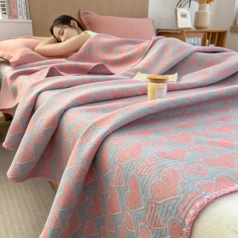 Pink and gray heart-patterned quilted decorbites cotton towel blanket perfect for bedroom use