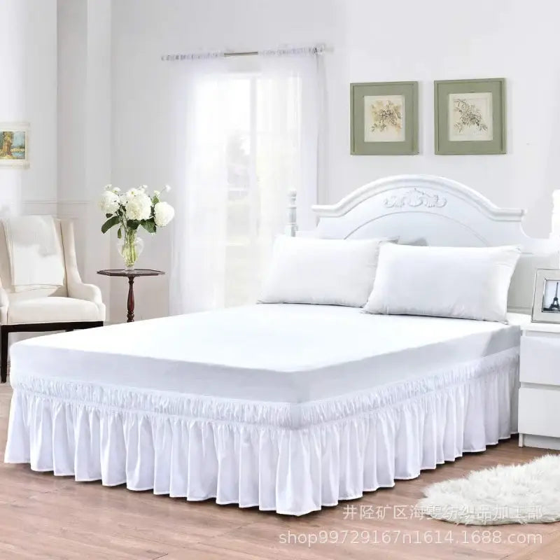 White ruffled elastic bed skirt with smooth flowing fabric finish in solid color for bedroom wrap around use
