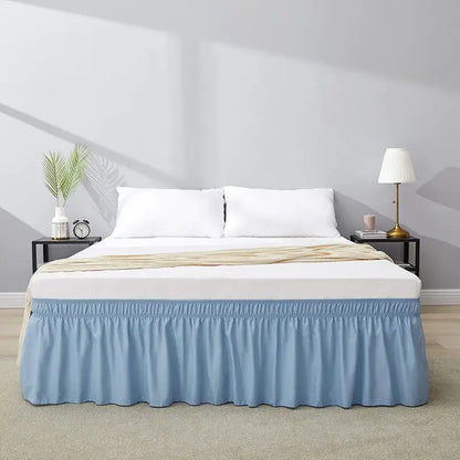 Light blue ruffled elastic bed skirt with soft fabric and elasticated waistband for a solid color bedroom wrap around