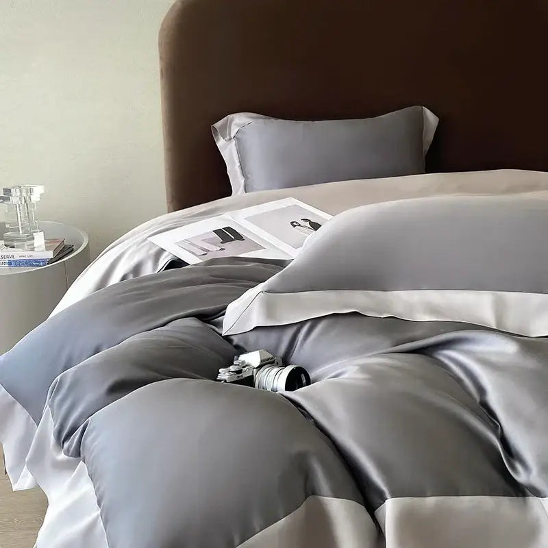 Gray satin duvet cover set with subtle sheen and white piping in a pink satin eucalyptus fiber bedding set by decorbites eucalyptus fiber