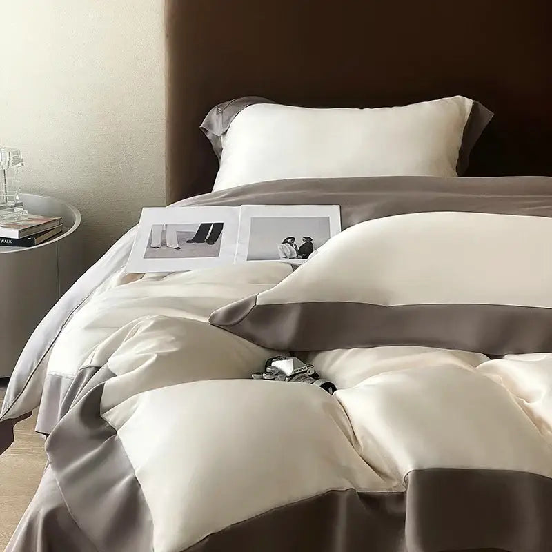 Cream and taupe satin duvet cover bedding set with eucalyptus fiber featuring sleek two-tone design for decorbites luxury