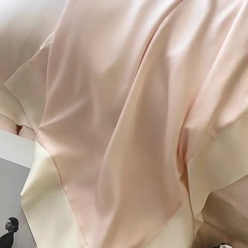 Pink satin eucalyptus fiber bedding set with soft blush pink glossy fabric and gentle folds from decorbites eucalyptus fiber
