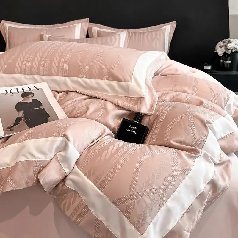 Pink satin jacquard duvet cover set with subtle geometric embroidery and crisp white piping for bedroom use