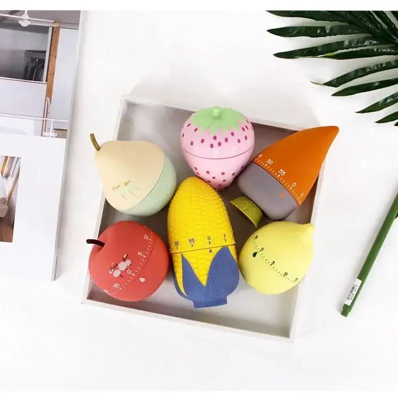Pink strawberry cartoon cake kitchen timer made of plastic with colorful fruit shapes and numbers for cake kitchen timer use
