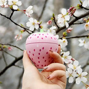 Pink strawberry cartoon cake kitchen timer with dotted pattern and green stem for cake kitchen use