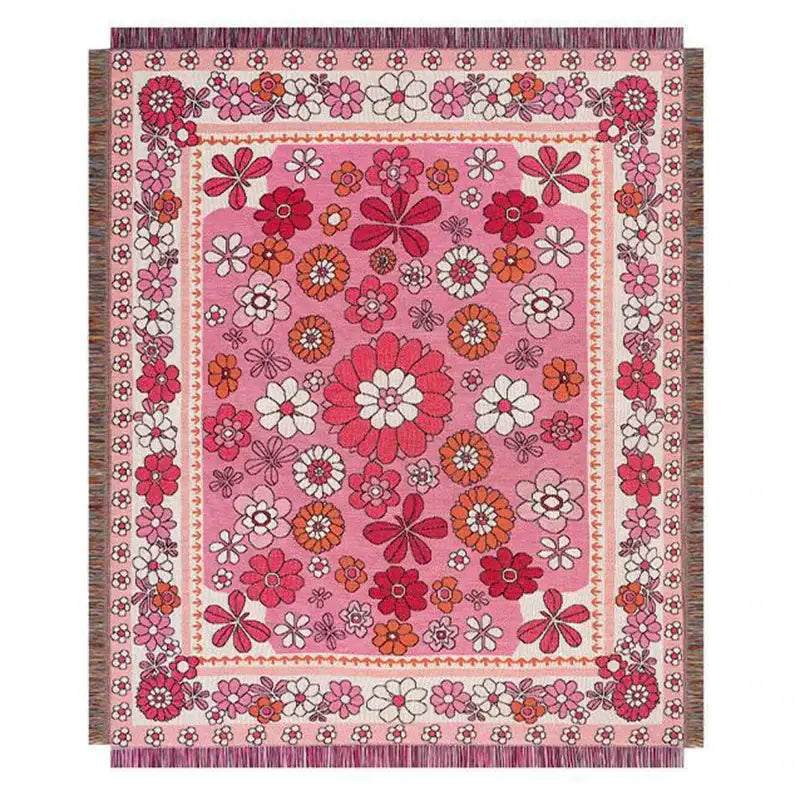 A vibrant pink cat strawberry knitted blanket with bold floral pattern and tassels for bedroom or sofa decorbites use