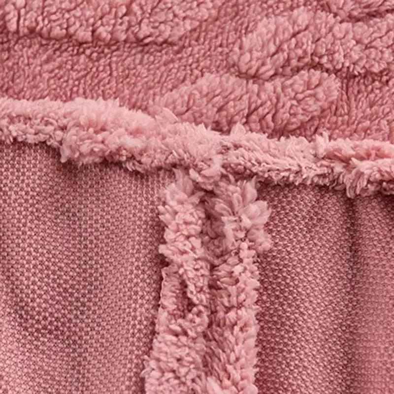 Pink textured cozy tafu fleece queen bed sheet featuring soft plush fabric and matching fuzzy drawstring for decorbites cozy tafu