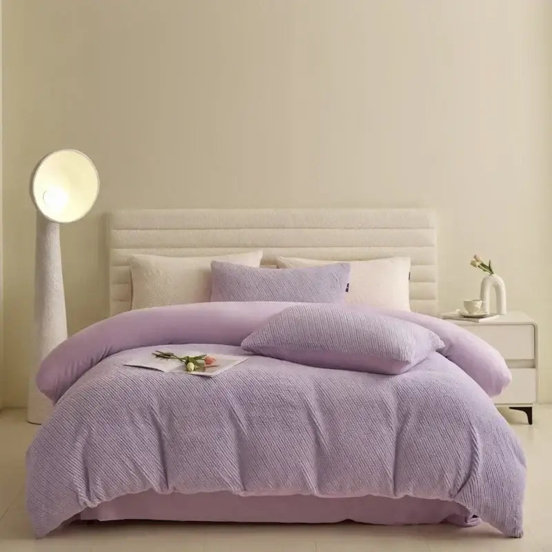 Lavender textured winter fleece bedding set with matching duvet cover and pillows for cozy bedroom use