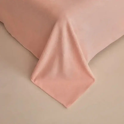 Soft blush pink winter fleece bedding set featuring smooth textured fabric with gentle folds and a clean hem