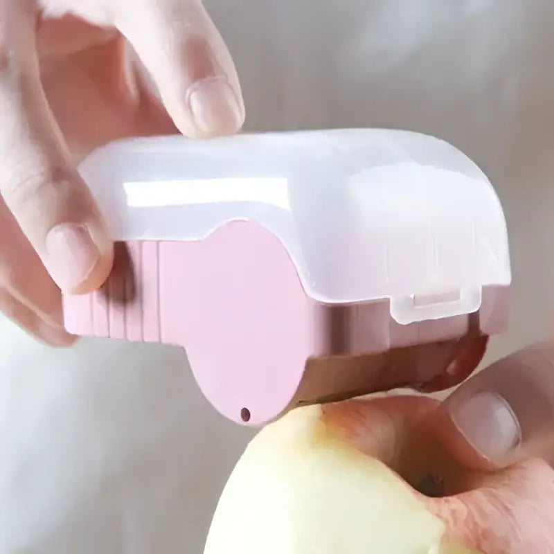 Pink plastic egg-shaped afralia snail peeler container with clear lid for storing small kitchen items