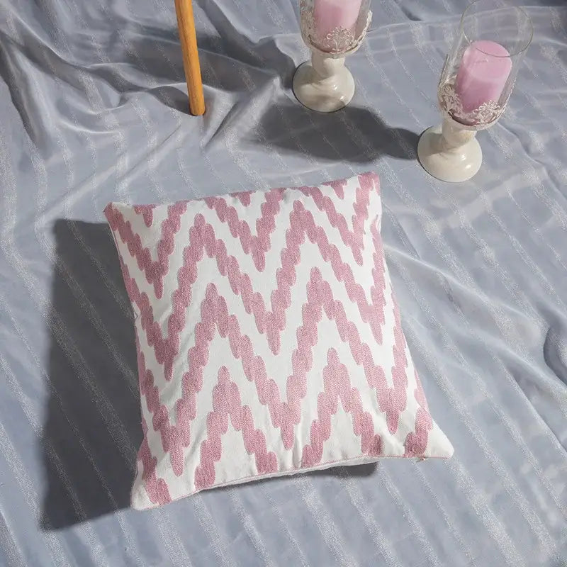 A square cotton flower embroidered geometry pillow with pink zigzag ikat pattern on white base for living room decorbites cotton flower