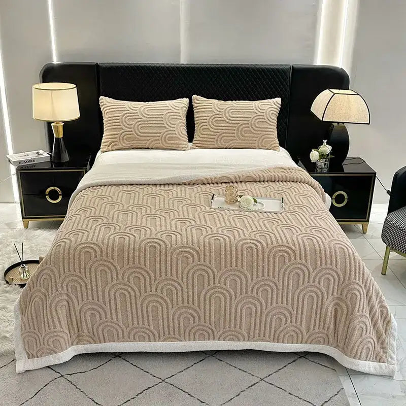 Beige textured plush blanket with double layered flannel arch and white fleece border for bedroom use