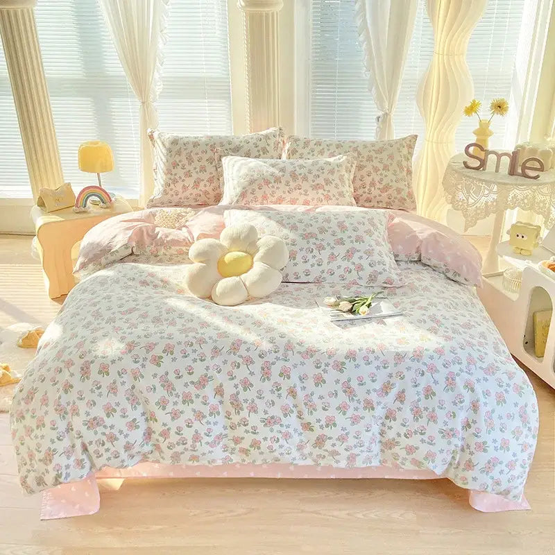 Pink and white floral decorbites cotton printed bedding set with soft cotton texture and satin finish for bedroom use