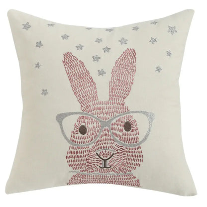 Cream-colored cushion cover with embroidered pink and silver bunny wearing glasses and star motifs for living room decorbites bunny cushion
