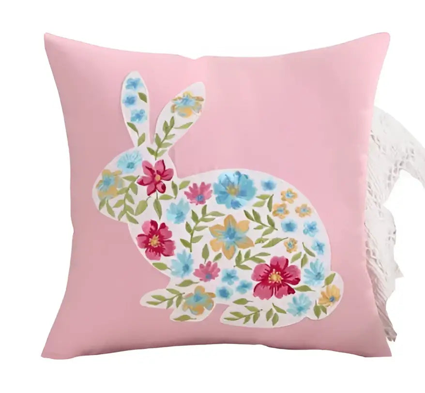 Pink cushion cover with white bunny silhouette filled with colorful floral patterns for living room decorbites bunny cushion