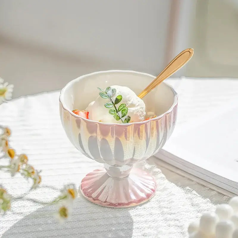 Pink and white gradient gloss ceramic dessert bowl with fluted rim holding ice cream garnished with green leaves decorbites gradient gloss
