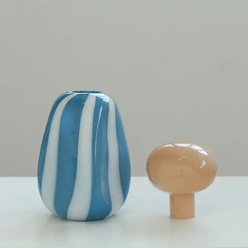 Blue and white vertically striped glass vase with pink and white striped ceramic vase cover band for living room decor