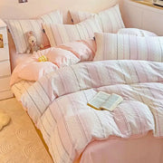 Pastel pink and white striped jacquard cotton bedding set featuring subtle textured weave by decorbites jacquard cotton