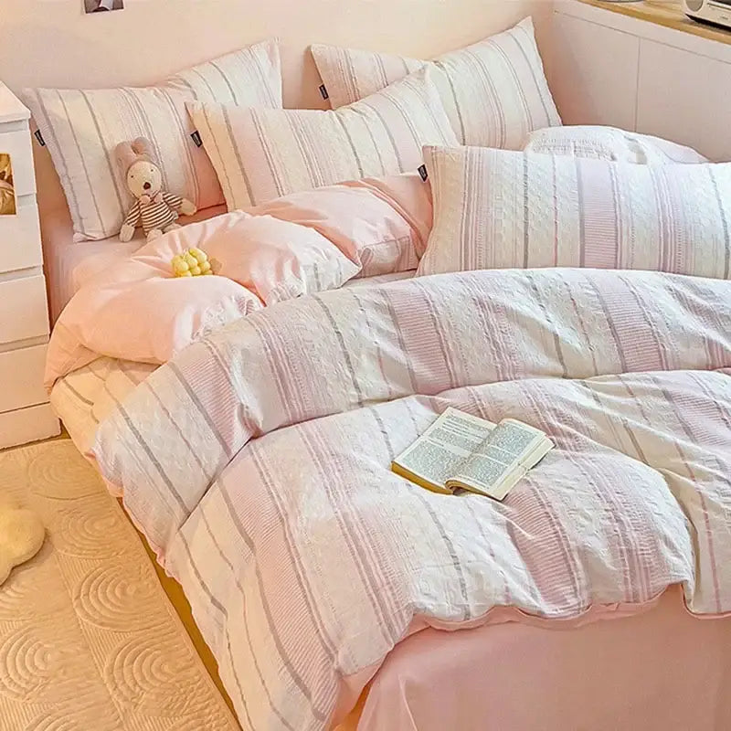 Pastel pink and white striped jacquard cotton bedding set featuring subtle textured weave by decorbites jacquard cotton