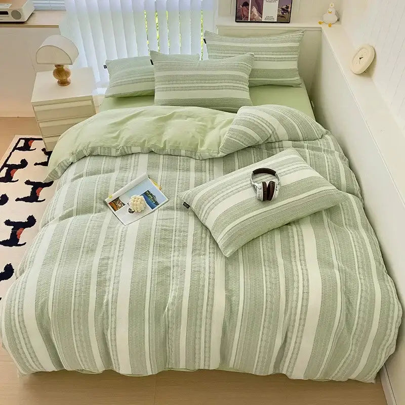 A soft mint green and white striped jacquard cotton bedding set with textured weave from decorbites jacquard cotton collection