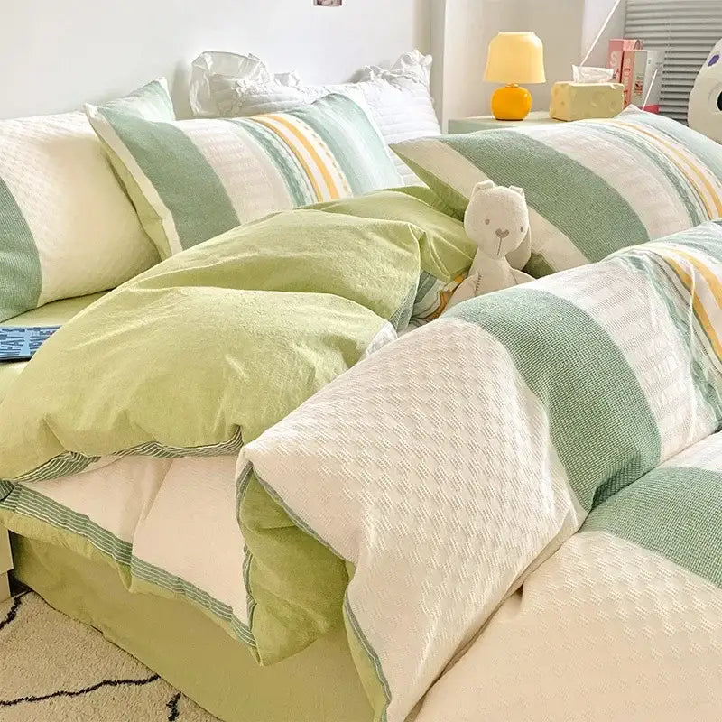 Soft mint green and cream striped duvet set in textured fabric from decorbites jacquard cotton bedding collection