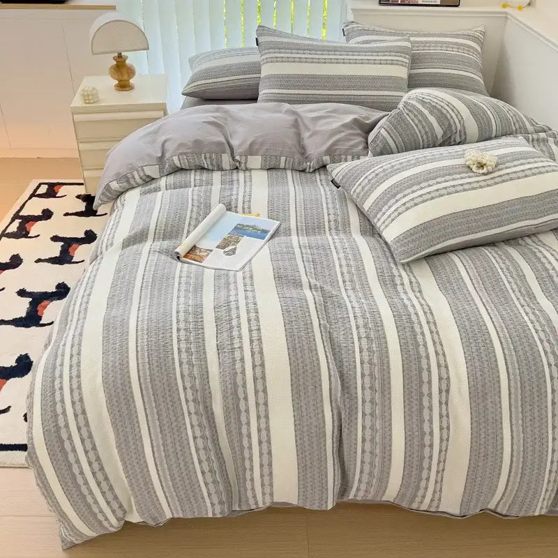 Gray and white striped duvet bedding set with textured vertical stripes in decorbites jacquard cotton bedding material