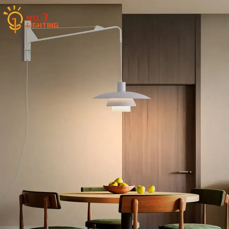 White wall lamp with a modern layered shade and swing arm featuring wind rotating function for bedroom use