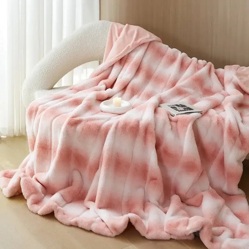 Pink and white tie-dye decorbites cozy fleece blanket with soft fuzzy texture perfect as a bedroom throw